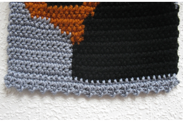 bottom edge of scarf