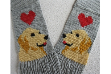 Golden Retriever Scarf. Gray knitted scarf with red hearts and yellow dogs