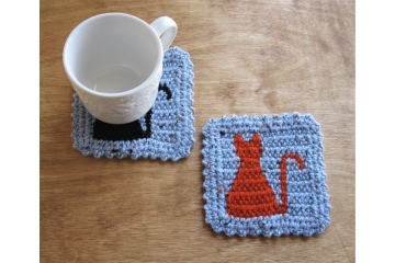 Cat coasters. Spa blue, flecked mug rugs with kitty silhouettes.