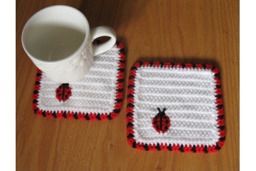 Ladybug Coasters. Large, white mug rugs with red and black Lady Bugs