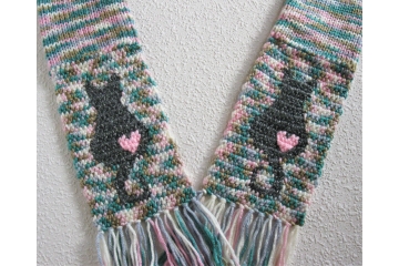 Kitty cat scarf. Colorful knit scarf with gray cat silhouettes and small pink hearts Kitty cat scarf. Colorful knit scarf with gray cat silhouettes and small pink hearts