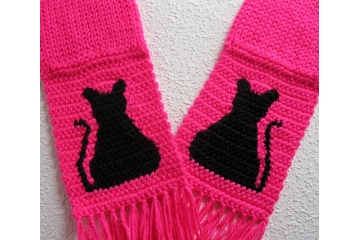 Pink Cat Scarf. Bright pink, knit and crochet scarf with black kitty silhouettes