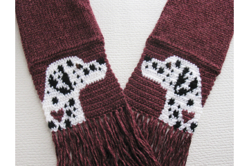 Dalmatian Dog Scarf. Autumn red, knit scarf with black and white spotted dogs and small hearts.